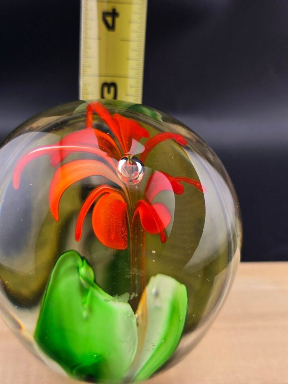 Handcrafted Clear Glass Paperweight With Orange Flower Design & Green Leaves - Picture 13 of 15